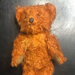 Antique stuffed bear, linen paws, glass eyes, in beautiful condition.
